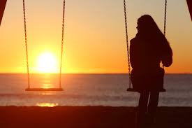 sunrise girl on swing